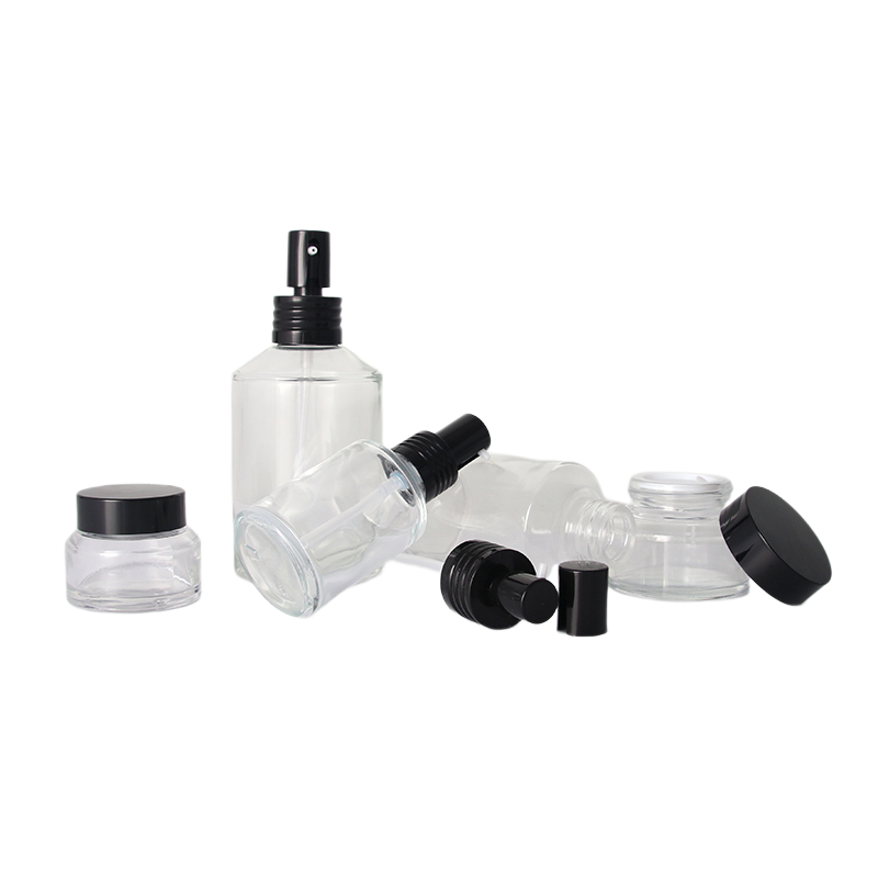 Sloping Shoulder Clear Glass Bottle with Black Lotion Pump and Lid
