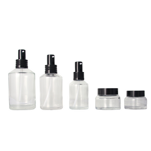 Sloping Shoulder Clear Glass Bottle with Black Lotion Pump and Lid