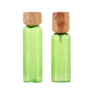 Green Refillable Travel Lotion with Bamboo Cap
